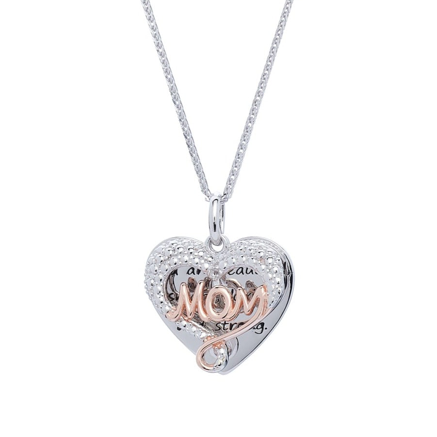 Close up shot of heart shape mom pendant with attached silver plate backdrop. Engraved message, ' You are beautiful, smart, loving and strong."